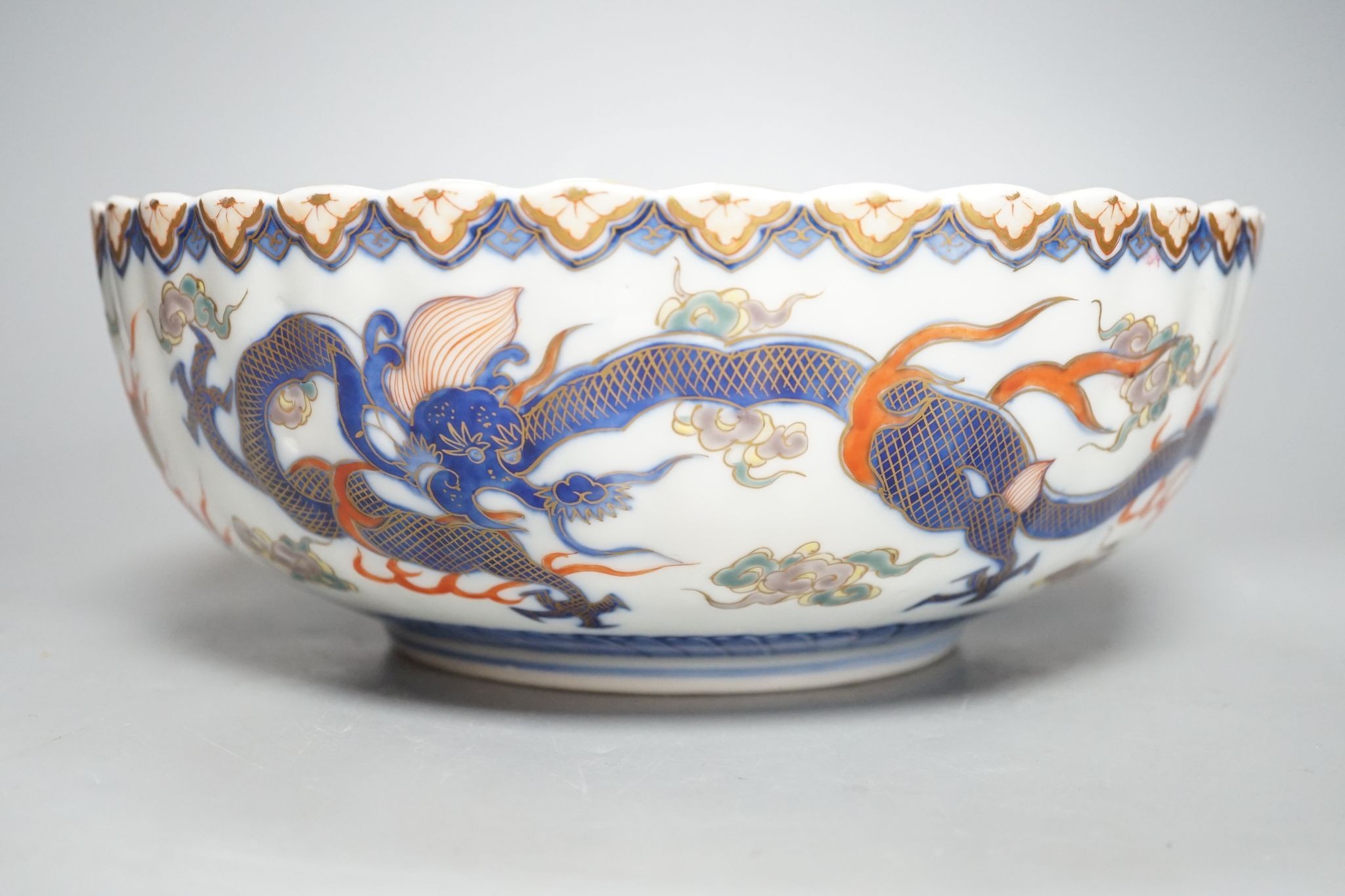 A Japanese Imari petal lobed bowl, by Fukugawa, 25 cms diameter.